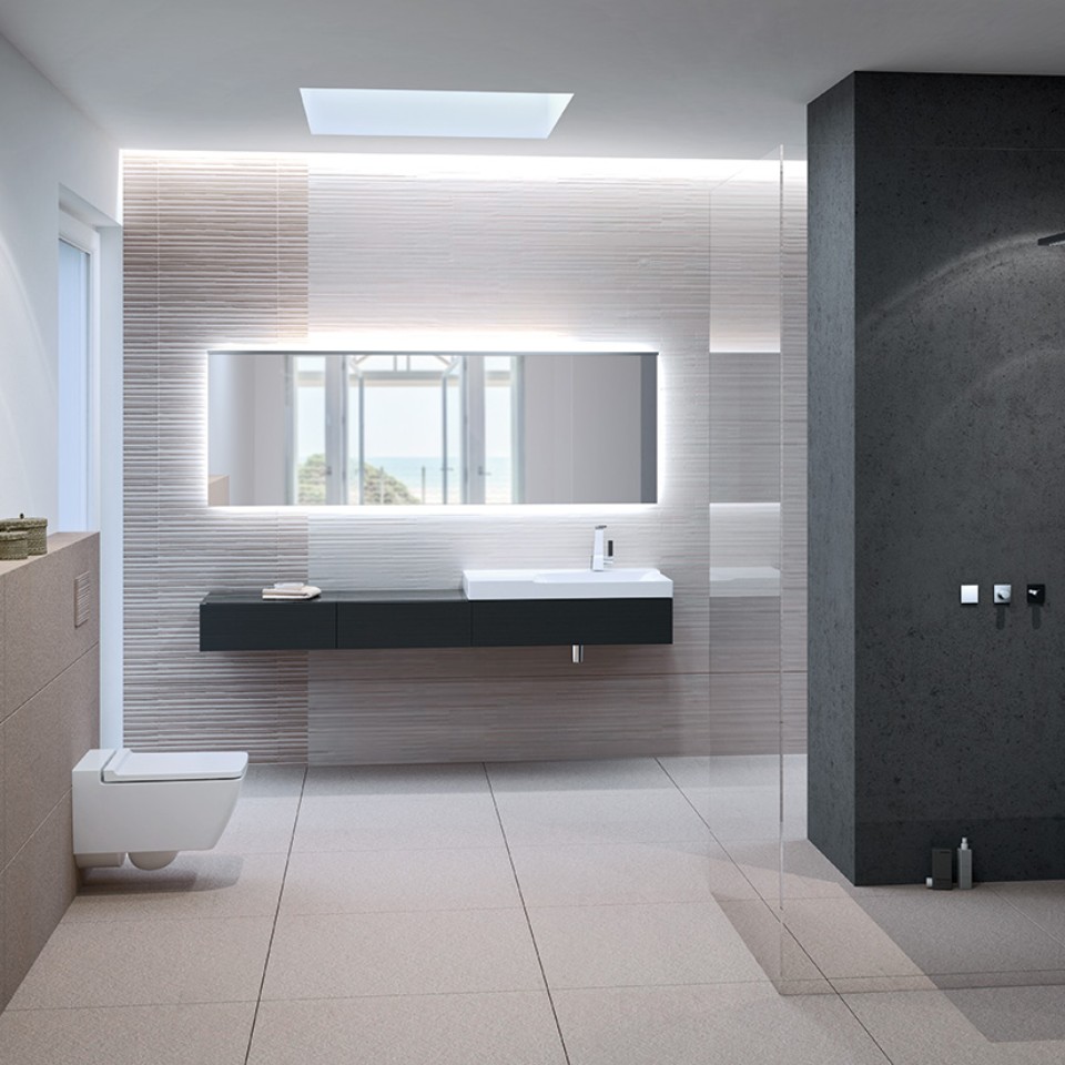 Casa de banho com sanita Rimfree e lavatório Geberit Xeno², e placa de descarga Sigma70 personalizável