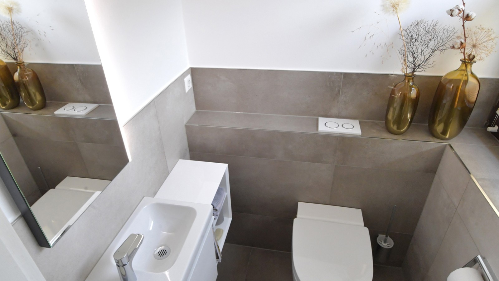 A casa de banho dos hóspedes após a renovação