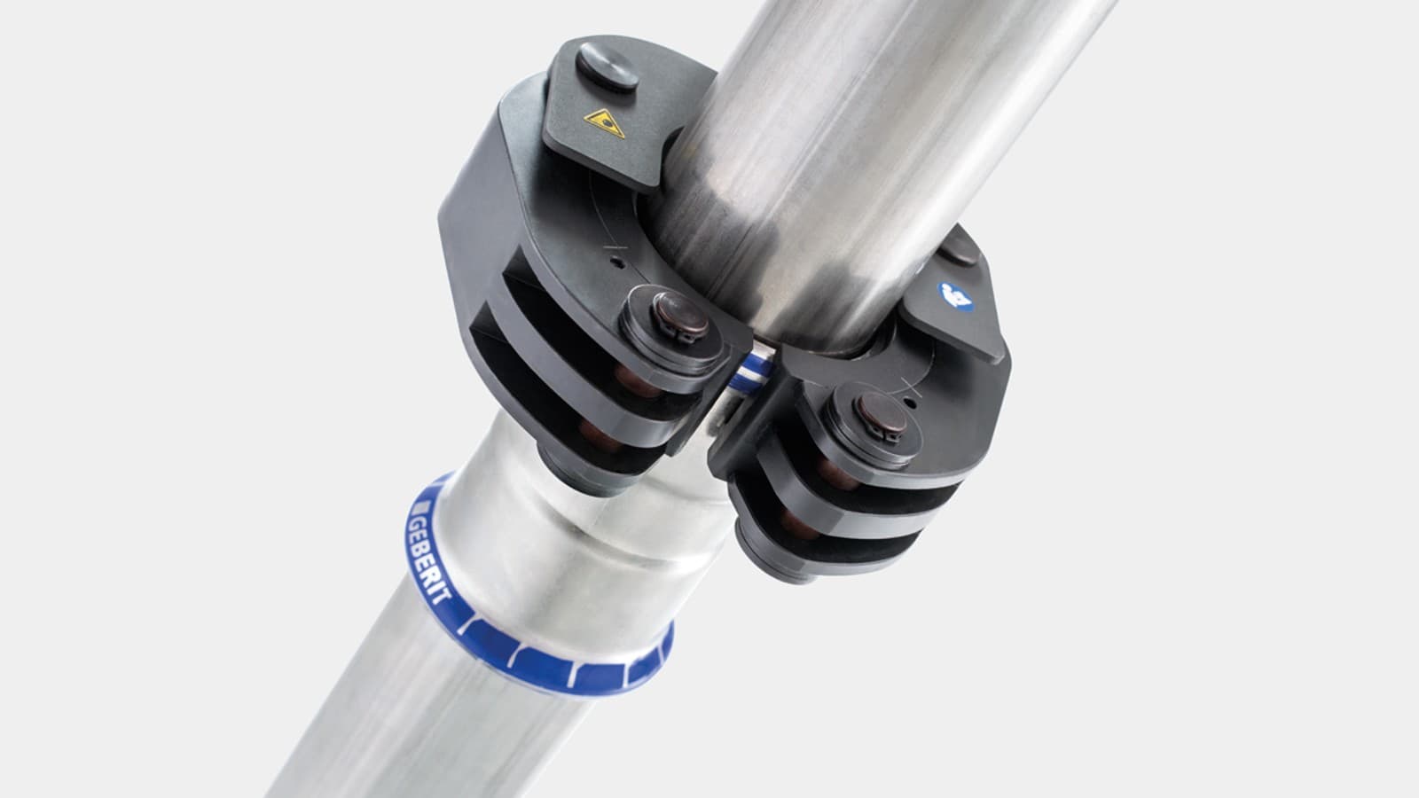 O mecanismo de encaixe fixa o colar de compressão Geberit no acessório Geberit Mapress O mecanismo de encaixe fixa o colar de compressão Geberit no acessório Geberit Mapress